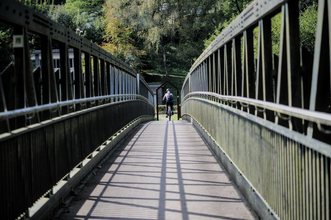 Scenic Vianden Bridge: Cyclist's Ourdall Promenade Paradise